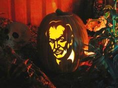 a pumpkin carved to look like abraham lincoln