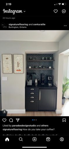 the instagram page on instagram com shows an image of a kitchen with black cabinets and appliances