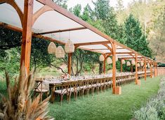 an outdoor dining area with tables and chairs