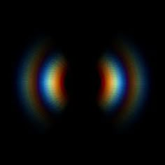 an image of two circles in the dark with light coming from one side and another half