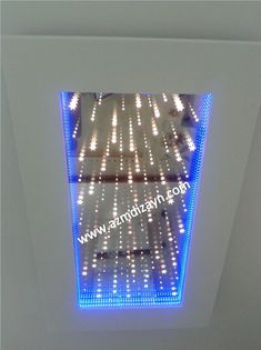 the ceiling is decorated with blue and white lights