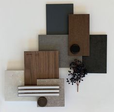 various materials are arranged on top of each other, including wood and concretes in different colors