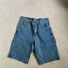 Never Worn Levi's Denim Blue Shorts With Pockets, Levi's Blue Shorts With Pockets, Levi's Blue Denim Shorts, Blue Levi's Jean Shorts, Blue Levi's Denim Shorts, Levi's High-waisted Blue Jean Shorts, Blue Denim Jean Shorts With Short Inseam, Levi's Medium Wash Shorts With Pockets, Blue Denim Shorts With Short Inseam