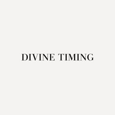 the words divine time are black and white