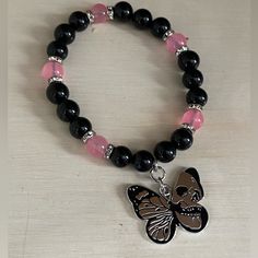 Beads Are Obsidian And Pink Jade. Silver Tone Spacers. Butterfly Charm With Skull Black Bracelets With Spacer Beads, Pink And Black Bracelets, Pink Jewelry With Black Beads For Gift, Black And Pink Bracelet, Black Crystal Bracelet As Gift, Dual Kawaii, Silver Star Bracelet, Royal Au, Diy Kandi Bracelets