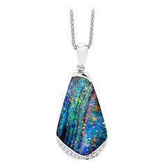 Beguiling and colourful, "Deseo” opal pendant enthrals with its colour-play. This 14.22 carat boulder opal from Winton displays a rare and prized panther pattern. The 18K pure white gold setting and flash of diamonds set off this splendid opal. Un objecto de deseo. Designed by Renata Bernard. The opal gem in this pendant comes from opal mines in Winton, Australia. The pendant is new. PARTICULARS: Size & Stone Measurements: Opal weight: 14.22ct Opal length: 40.78mm Opal width: 17.68mm Opal thickn Opals Jewelry, Dnd Dm, Boulder Opal Necklace, Orange Box, Boulder Opal Pendant, Opal Pendant Necklace, Australian Boulder Opal, White Gold Set, Solid Gold Chains