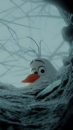 a cartoon character is peeking out from behind a tree branch with branches in the background