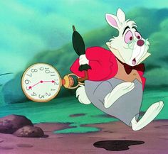 the rabbit is running with an alarm clock in his hand and he looks like he's ready to jump