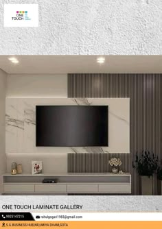 a living room with a large flat screen tv mounted to the side of it's wall