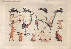 an old cross stitch pattern with animals and birds