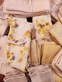 Naturally, hand-dyed in the Ozarks.  These organic cotton ribbed socks are naturally dyed with plants to create wonderful shades and beautiful textures. All socks are hand-dyed with plants to create a series of colors: Yellow (marigolds), pink (avocado pits), grey (avocado pits+iron), beige (avocado skins+ iron), and a patterned (bundle dyed with marigolds, onion skins, and Hopi black dye sunflower seeds). Each item is hand-dyed and one-of-a-kind; therefore, the actual item received may vary fro Natural Dye Socks, Eco Dyeing Fabric, Avocado Pits, Eco Dyeing, Ribbed Socks, Natural Detergent, The Ozarks, Pressed Flower Art, Plant Dyes