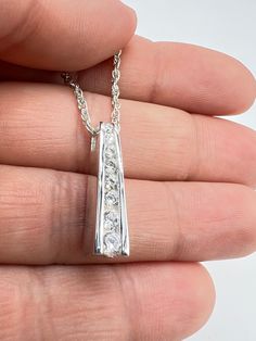 Beautiful urn necklace, 925 sterling silver, a beautiful way to keep the memory of a loved one or beloved pet's ashes/hair. ♥️FreePersonalization:Can be engraved on the back 12 characters maximum. ♥️Gift box included; Funnel kit included; ♥️Care Instructions Even though the materials used are made of sterling silver, I recommend you to not sleep, swim, or spray chemicals (i.e. perfumes, lotions, or body spray) on to the necklace to preserve its longevity. Please follow these tips to preserve the longevity of the necklace. To clean, it is best to use a soft microfiber cloth to clean the jewelry from smudges. ✿ Questions & Concerns ?  Have any questions? Please do not hesitate to send me a message with further questions and concerns. I will be more than happy to assist you! :) Thank you for Silver Hypoallergenic Jewelry For Keepsake, Anniversary Jewelry With Rectangular Polished Pendant, Hypoallergenic Silver Jewelry For Keepsake, Elegant Sterling Silver Necklace With Channel Set, White Gold Rectangular Pendant Jewelry For Anniversary, Sterling Silver Rectangular Pendant Keepsake Jewelry, Silver Hypoallergenic Memorial Jewelry, Sterling Silver Channel Set Jewelry As A Gift, Sterling Silver Channel Set Jewelry Gift