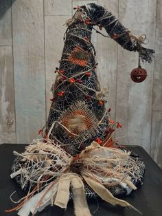 a halloween tree made out of wire and fabric