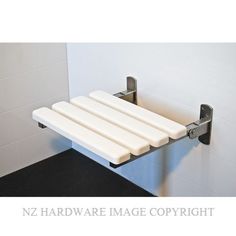 a close up of a towel rack in a bathroom