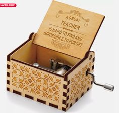 a wooden music box with the words great teacher is hard to find and impossible to forget