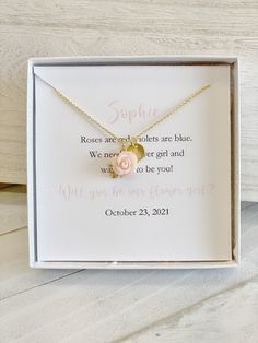 a box with a necklace in it that says, sopher roses are not violets but we need to get and will you be for you?