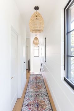 the hallway is clean and ready for us to use as an entrance way in this home