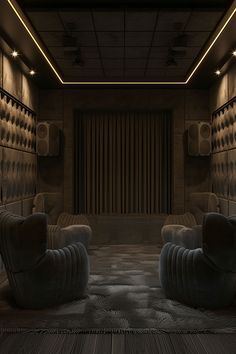 a dimly lit room with two reclining chairs