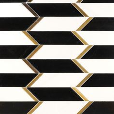 a black and white tile with gold lines