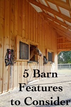 the inside of a barn with horses in it and text that reads 5 barn features to consider