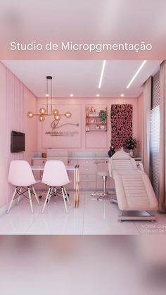 a pink room with two chairs and a table in the center is featured for an advertisement