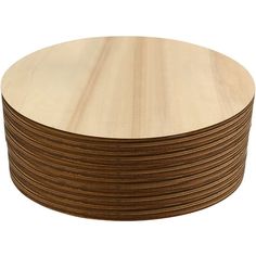 a stack of wooden discs on a white background