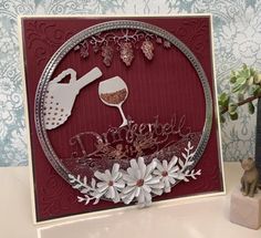 there is a card with some flowers and wine glasses on it that says happy mother's day