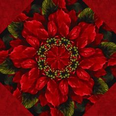 a red flower with green leaves in the center on a red background that looks like it has been made out of fabric