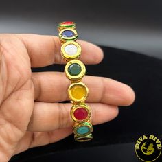 Manika Navratan Bracelet - Bangle -Bangle, Bracelet, Diva Exclusive, moissanite - Divahive Adjustable Multicolor Crystal Bangle Bracelet, Spiritual Multicolor Bracelets As Gifts, Metal Bangle Bracelets For Festivals, Fusion Style Bracelets As Festival Gifts, Multicolor Metal Bracelets For Wedding, Festival Bangle Bracelets As Gifts, Multicolor Fusion Style Bracelets For Party, Multicolor Fusion Bracelets, Colorful Bohemian Bangle Jewelry