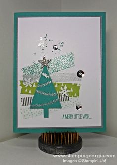 a card with a christmas tree on it