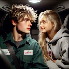 a man and woman sitting in the back seat of a car looking into each other's eyes