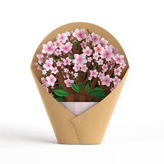 a bouquet of pink flowers in a brown paper wrapper on a white background with clippings