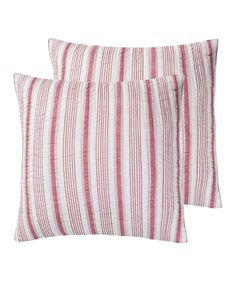 two red and white striped pillows