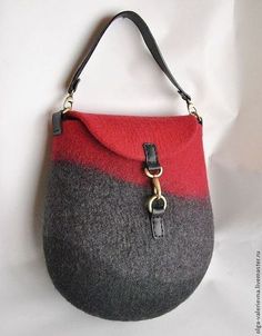 a handbag with a red and grey color blocking