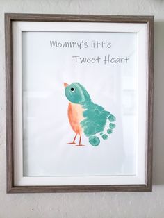 a framed print with the words mommy's little tweet heart