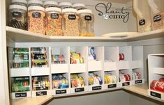 a pantry filled with lots of different types of food and snacks in bins next to each other