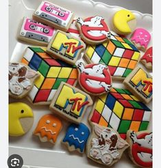 decorated cookies are arranged on a tray