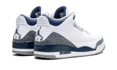 The Air Jordan 3 "Midnight Navy" is a colorway of the retro basketball shoe with navy accents.  Michael Jordan’s third signature shoe in the “Midnight Navy” colorway features a white leather upper with elephant print overlays on the toe and heel.  A Midnight Navy-colored mudguard contrasts the look, as do the Midnight Navy eyelet holes.  More Midnight Navy accenting is featured on the Jumpman on the white leather tongue and on the Jumpman on the heel.  The white midsole has a visible Air bubble Jordan 3 Midnight Navy, Nike Air Jordan 3, Nike X Travis Scott, Converse Run Star Hike, Low Air Jordan 1, Jordan Logo, White Cement, Jordan 3 Retro, Adidas Spezial