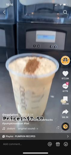 a cup of coffee sitting on top of a counter