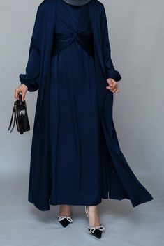 Vidonia 2 piece luxury 2 piece abaya with wrap bodice in navy - ANNAH HARIRI Blue Long Sleeve Satin Sets, Blue Satin Long Sleeve Sets, Eid Satin Maxi Dress, Evening Solid Color Maxi Length Abaya, Evening Solid Maxi Length Abaya, Evening Maxi Length Solid Abaya, Elegant Navy Long Sleeve Set, Eid Evening Solid Color Abaya, Elegant Solid Color Abaya For Eid