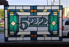 a stained glass window with the number 522 on it