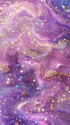 an abstract painting with gold glitters and purple fluid paint on the bottom half of it