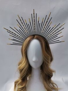 'Liberty' is a classic handmade black and gold crown with hand-painted spikes and individually added beads, diamonds, and glitter. It is the perfect unique accessory to add that wow factor to your outfit for any occasion, a Birthday party, Weddings, A Day at the Races, your festival outfit, Hen Parties, Engagements/Weddings, Halloween, Formals, and will be a great addition for photography or make-up artists.  I would be very happy to do custom orders to suit your requirements, for colourways and sizes just send me a message. This sturdy lightweight crown will also allow you to naturally style your hair.    *colour tone may vary because of the monitor display settings   *size may vary due to being handmade   Crowns from my studio are all artworks, each piece is original and made with love < Black And Gold Crown, Handmade Crowns, Black Hair Accessories, Festival Headpiece, Day At The Races, Halo Crown, Halo Halo, Black Headband, Gold Crown