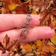 Discover The Beauty Of Simplicity And Elegance With Our Handcrafted Oxidized Copper Wire Wrap Ring. This Adjustable Ring Is Designed For Those Who Appreciate Unique, Artisan Jewelry That Stands Out. Each Ring Is Meticulously Wrapped By Hand, Showcasing The Rich, Dark Tones Of Oxidized Copper. The Adjustable Design Ensures A Perfect Fit For Any Finger Size, Making It An Ideal Gift Or Personal Accessory. Key Features: Material: High-Quality Oxidized Copper Design: Handcrafted Wire Wrap Adjustable: Diy Wire Jewelry Rings, Wire Wrap Ring, Wire Jewelry Rings, Copper Crafts, Wrapped Rings, Copper Design, Oxidized Copper, Diy Wire Jewelry, Wrap Ring