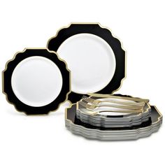 black and white plates with gold rims