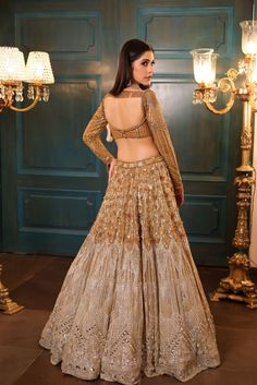 Ombre Gold Silver Lehenga Sequin Lehenga For Eid Reception, Eid Reception Lehenga With Sequins, Gold Lehenga With Dupatta For Reception, Gold Embellished Choli, Gold Choli With Dupatta For Reception, Gold Bollywood Designer Lehenga, Bollywood Style Designer Gold Lehenga, Embellished Gold Choli, Gold Sharara With Sequins In Traditional Drape