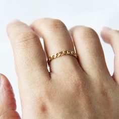 A simple gold chain ring made a thick 14k gold filled chain!  ∙ Gift Ready in a jewelry box! ∙ Handmade in Vancouver, Canada.  ∙ 100% 14k Gold Fill  --------------------------------- M E A S U R E M E N T :  Width: 3.3mm  Size: Optional (US Measurement)  Please note that due to the links, the sizes might be slightly off.  -------------------- G I F T I N G ?  We make gifting as easy as pie! All our orders are gift ready! We offer FREE gift messages to be included in your order, just simply write Gold Plated Chain Promise Ring, Gold Link Chain Ring In Minimalist Style, Gold Plated Tarnish Resistant Chain Ring As Gift, Gold Chain Link Promise Ring, Gold Plated Chain Rings As Gift, Gold Chain Ring For Gift, Minimalist Gold Chain Link Rings, Minimalist Gold-plated Chain Ring, Minimalist Gold Chain Ring With Adjustable Chain