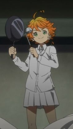 an anime character holding up a frying pan