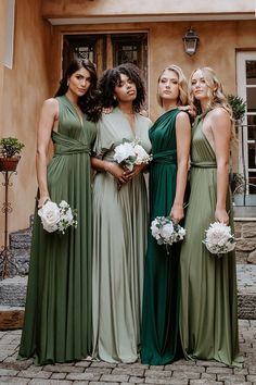 the bridesmaids are all dressed in green dresses