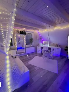 the room is decorated in white and purple lights